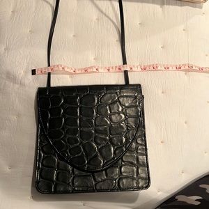 Square black alligator look crossbody purse.